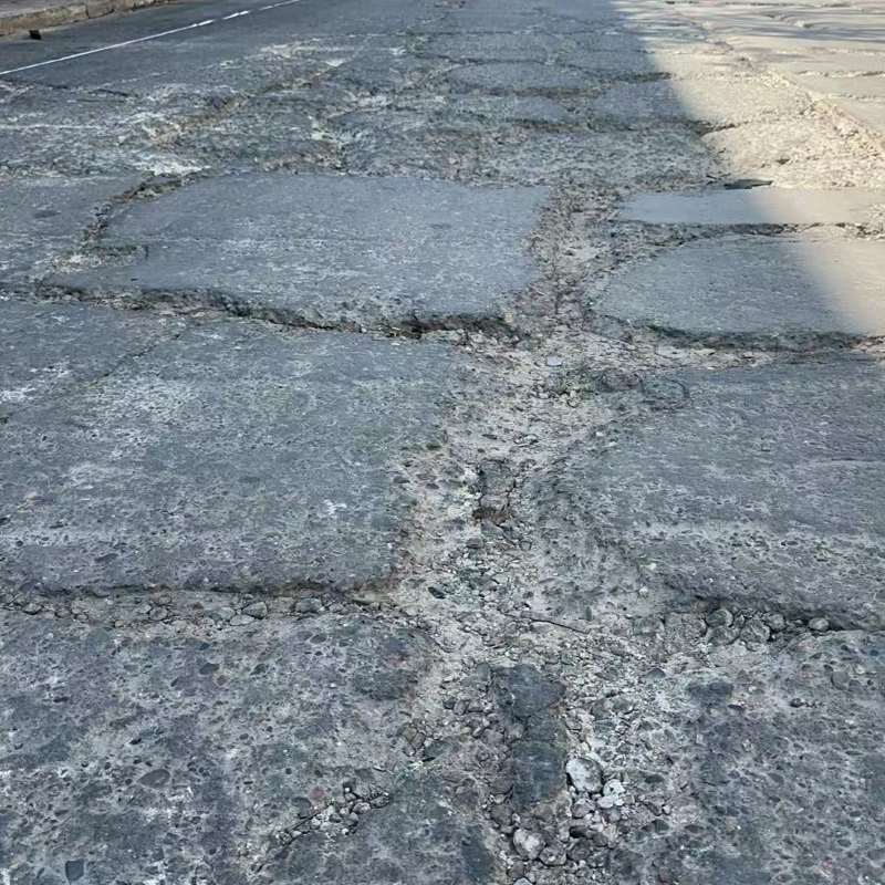 大连路面起砂露石子修补料